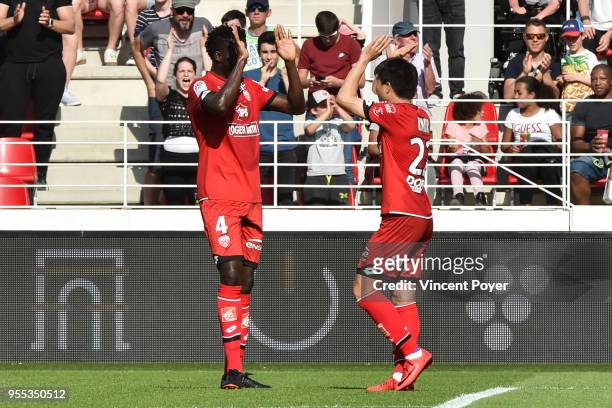 Papy and KWON Chang Hoon of Dijon celebrate the goal during the Ligue 1 match between Dijon FCO and EA Guingamp at Stade Gaston Gerard on May 6, 2018...
