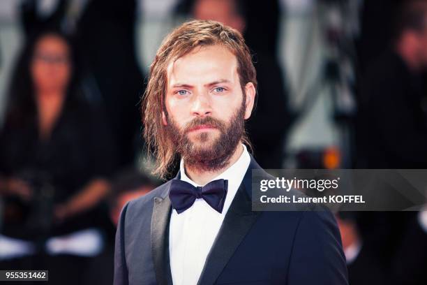 Alessandro Borghi walks the red carpet ahead of the 'Loving Pablo' screening during the 74th Venice Film Festival at Sala Grande on September 6, 2017...