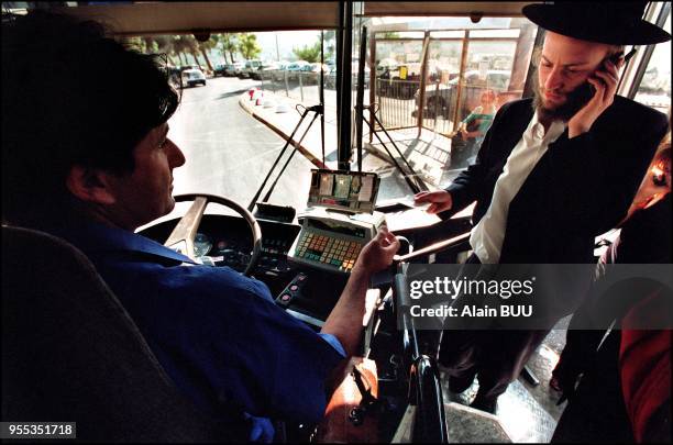 Eli Bensoussan, 47 years old, married with two children, driving bus n° 32A .