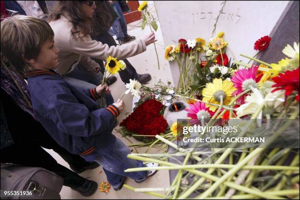 Israeli citizens pay their respects by laying flowers at the grave site of the late Prime Minister Yitzhak Rabin after a memorial service in...