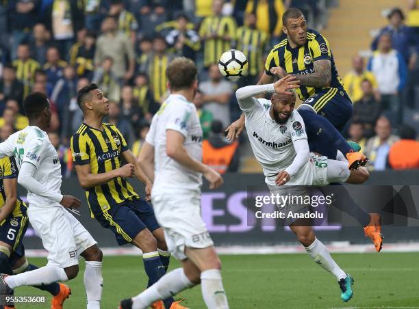 Jose Fernandao of Fenerbahce in action against John Bostock of Bursaspor during Turkish Super Lig soccer match between Fenerbahce and Bursaspor at...