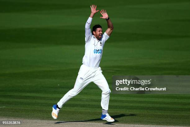 David Wiese of Sussex celebrates after taking the wicket of James Harris of Middlesex during day three of the Specsavers County Championship:...