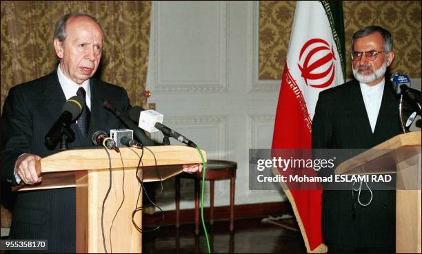 Lamberto Dini and Kamal Kharazi.