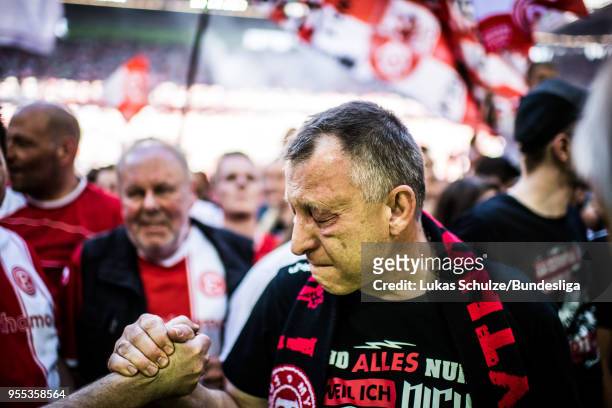 Fan of Duesseldorf reacts after the Second Bundesliga match between Fortuna Duesseldorf and Holstein Kiel at Esprit-Arena on May 6, 2018 in...