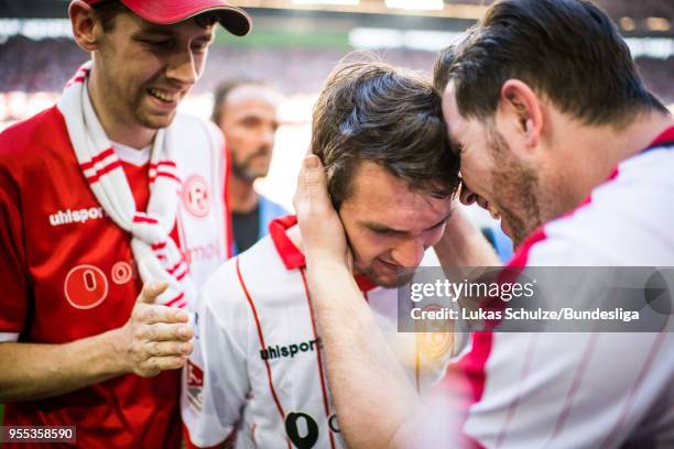 Benito Raman of Duesseldorf celebrates with fans after the Second Bundesliga match between Fortuna Duesseldorf and Holstein Kiel at Esprit-Arena on...