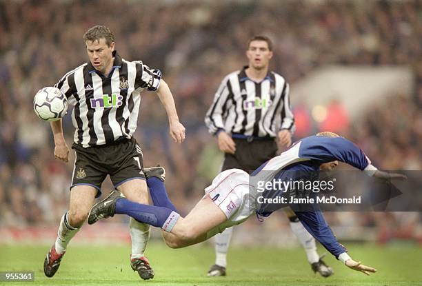 Rob Lee of Newcastle United fouls Alun Armstrong of Ipswich Town during the FA Carling Premiership match at Portman Road in Ipswich, England. Ipswich...