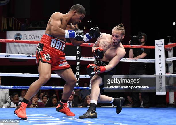 Mykquan Williams battles Orlando Felix during their WBC USNBC Silver Lightweight Championship bout on May 5, 2018 at the Foxwoods Fox Theater in...