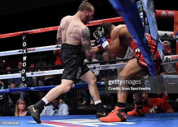 Mykquan Williams battles Orlando Felix during their WBC USNBC Silver Lightweight Championship bout on May 5, 2018 at the Foxwoods Fox Theater in...