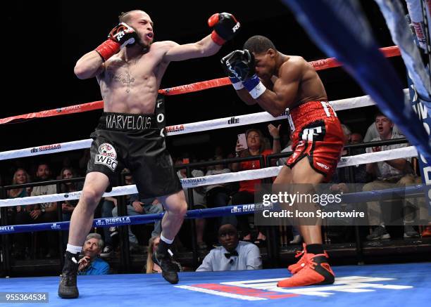 Mykquan Williams battles Orlando Felix during theirWBC USNBC Silver Lightweight Championship bout on May 5, 2018 at the Foxwoods Fox Theater in...