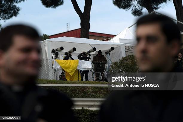 Photographers take their position in front of Gemelli Policlinico after Pope John Paul was rushed to a Rome hospital.
