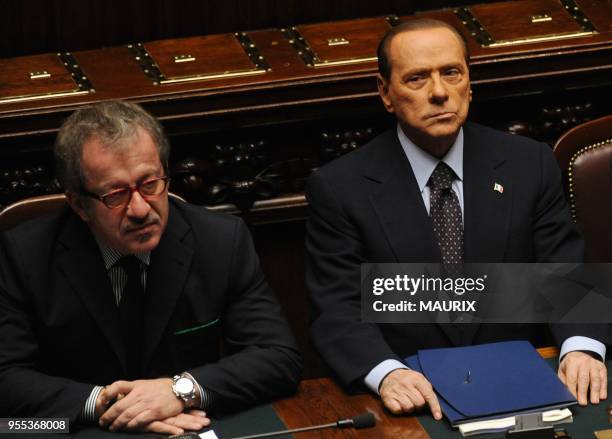 Interior Minister Roberto Maroni and Italian Prime Minister Silvio Berlusconi attend a vote at the Chamber of Deputies on November 8, 2011 in Rome,...