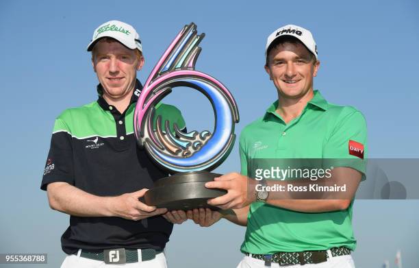 Gavin Moynihan of Ireland and Paul Dunne of Ireland with the winners trophy after the final of the Golf Sixes at The Centurion Club on May 6, 2018 in...