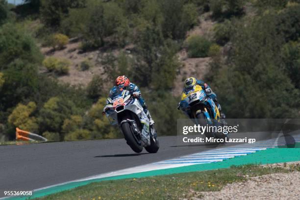 Esteve Rabat of Spain and Reale Avintia Racing leads Tom Luthi of Switzerland and and Team EG 0,0 Marc VDS during the MotoGp race during the MotoGp...