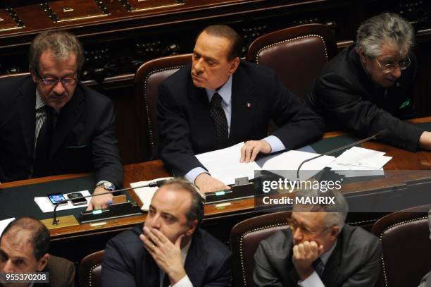 Interior Minister Roberto Maroni, Italian Prime Minister Silvio Berlusconi and Reform Minister Umberto Bossi attend a vote at the Chamber of Deputies...