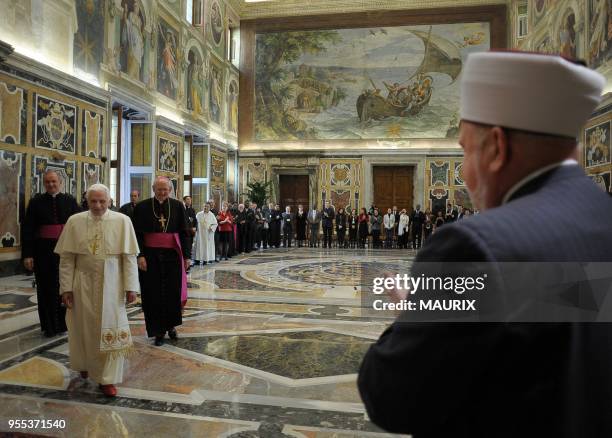 Pope Benedict XVI greets Muslim delegation head Mustafa Ceric , the Grand Mufti of Bosnia - Christians and Muslims must overcome their...