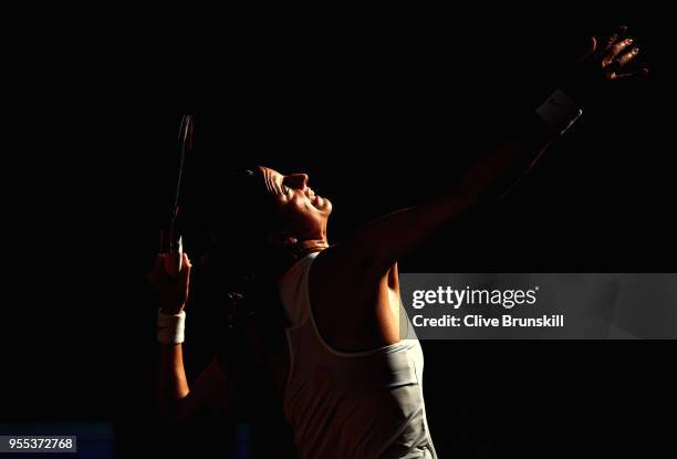 Petra Kvitova of the Czech Republic serves against Lesia Tsurenko of the Ukraine in their first round match during day two of the Mutua Madrid Open...