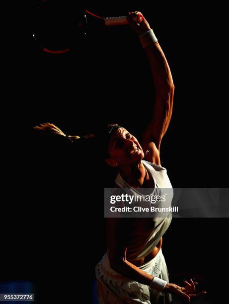Petra Kvitova of the Czech Republic serves against Lesia Tsurenko of the Ukraine in their first round match during day two of the Mutua Madrid Open...