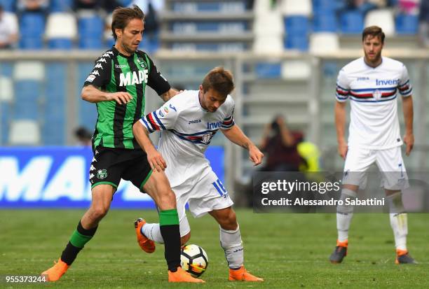 Simone Missiroli of US Sassuolo competes for the ball whit Karol Linetty of UC Sampdoria during the serie A match between US Sassuolo and UC...