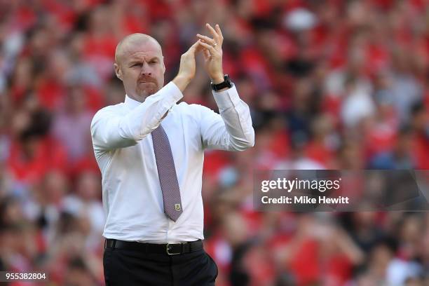 Burnley manager Sean Dyche salutes the Burnley fans after the Premier League match between Arsenal and Burnley at Emirates Stadium on May 6, 2018 in...