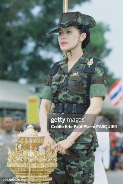 Queen Sirikit in military costume.