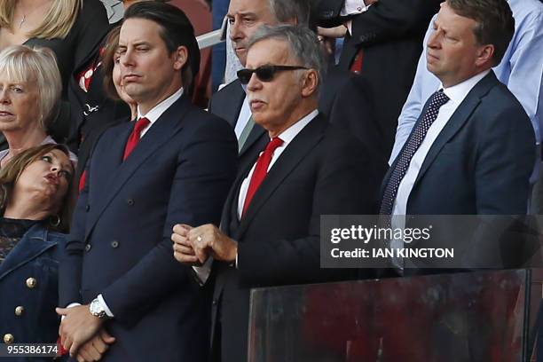 Arsenal's US owner Stan Kroenke looks on during the presentation to Arsenal's French manager Arsene Wenger after the English Premier League football...