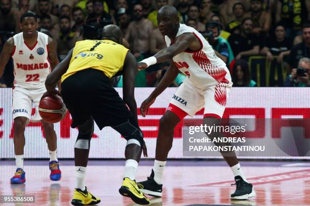 Monaco's Amara Sy vies with AEK Athens' Delroy James during the final four Champions League final basketball game between AS Monaco and AEK B.C. At...