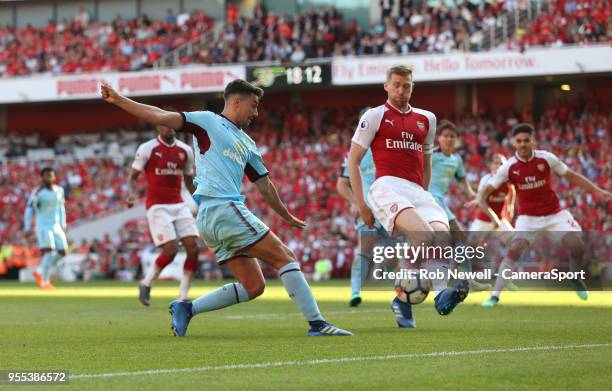 Burnley's Matthew Lowton gets in a cross during the Premier League match between Arsenal and Burnley at Emirates Stadium on May 6, 2018 in London,...