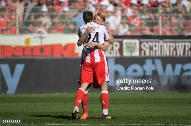 Steven Skrzybski and Simon Hedlund of 1 FC Union Berlin celebrate after scoring the 2:0 during the second Bundesliga game between Union Berlin and...