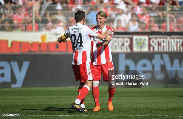 Steven Skrzybski and Simon Hedlund of 1 FC Union Berlin celebrate after scoring the 2:0 during the second Bundesliga game between Union Berlin and...