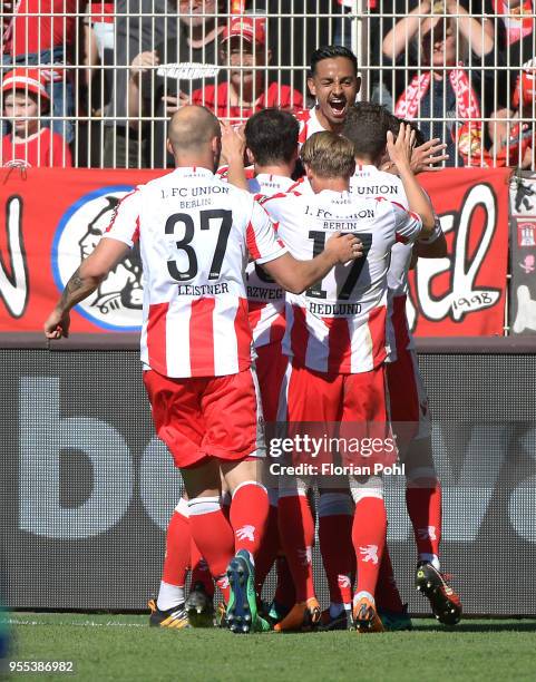 Toni Leistner, Simon Hedlund and Kenny Prince Redondo of 1 FC Union Berlin celebrate after scoring the 1:0 during the second Bundesliga game between...