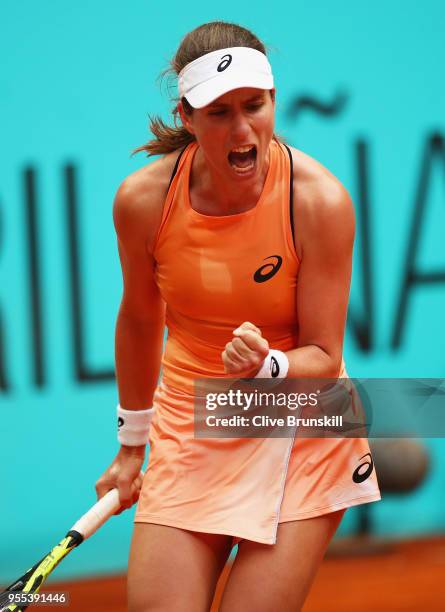 Johanna Konta of Great Britain celebrates winning the first set against Magdalena Rybarikova of Slovakia in their first round match during day two of...