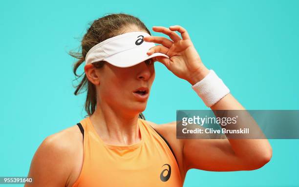 Johanna Konta of Great Britain shows her emotions against Magdalena Rybarikova of Slovakia in their first round match during day two of the Mutua...