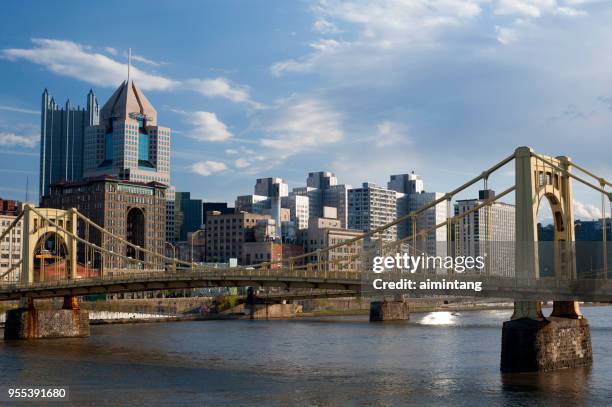 bridge in pittsburgh with view of downtown skyline - pittsburgh bridge stock pictures, royalty-free photos & images