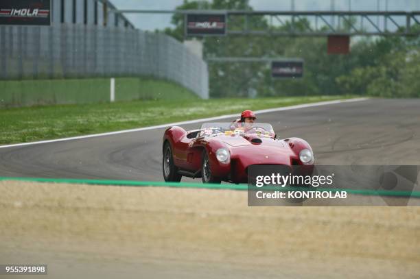 An old Ferrari race car during Minardi Day in Imola. During this demonstration, the historic cars of Formula 1, Formula 2, Formula 3, Gran Turismo...