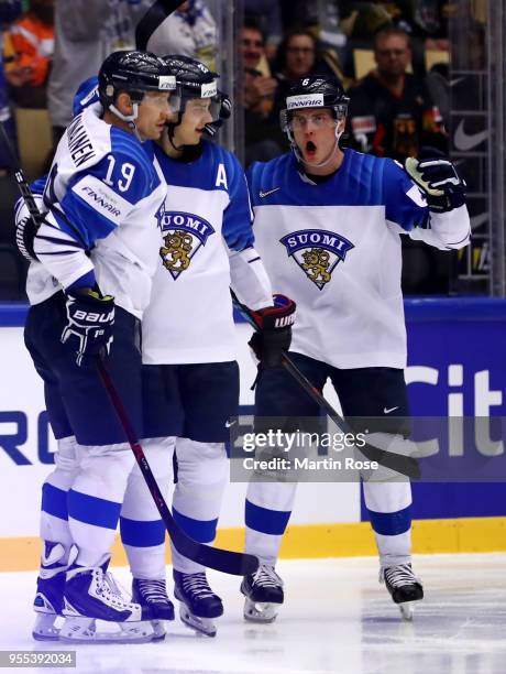 Sebastian Aho of Finland celebrate with Veli Matti Savinainen and Julius Honka after he scores the opening goal during the 2018 IIHF Ice Hockey World...