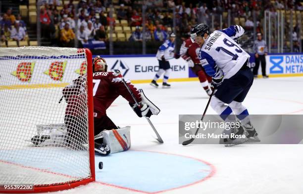 Veli Matti Savinainen of Finland scores his teams 2nd goal during the 2018 IIHF Ice Hockey World Championship group stage game between Latvia and...