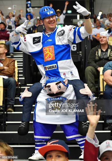 Finland's supporters celebrate during the group B match Latvia vs Finland of the 2018 IIHF Ice Hockey World Championship at the Jyske Bank Boxen in...