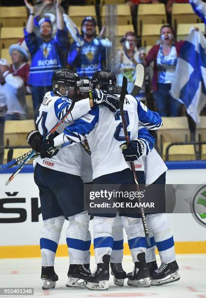 Finland's players celebrate their goal during the group B match Latvia vs Finland of the 2018 IIHF Ice Hockey World Championship at the Jyske Bank...