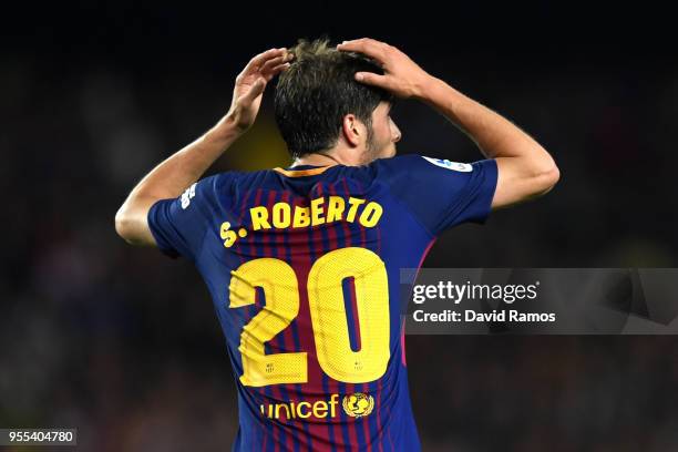 Sergi Roberto of Barcelona reacts as he is sent off during the La Liga match between Barcelona and Real Madrid at Camp Nou on May 6, 2018 in...