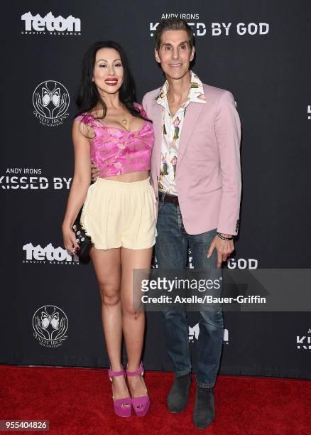 Singer Perry Farrell and wife Etty Lau Farrell arrive at Teton Gravity Research's 'Andy Irons: Kissed by God' World Premiere at Regency Village...