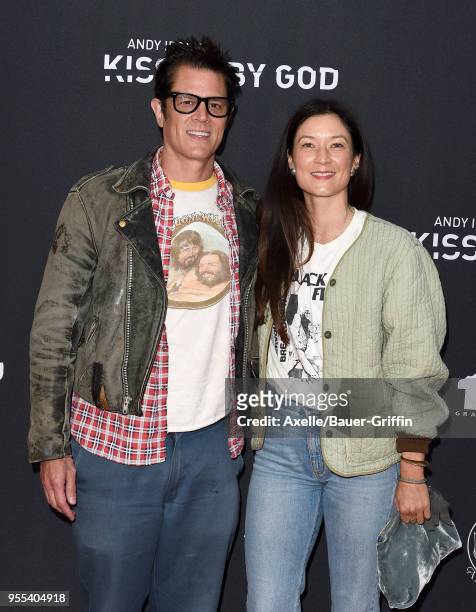 Actor Johnny Knoxville and wife Naomi Nelson arrive at Teton Gravity Research's 'Andy Irons: Kissed by God' World Premiere at Regency Village Theatre...