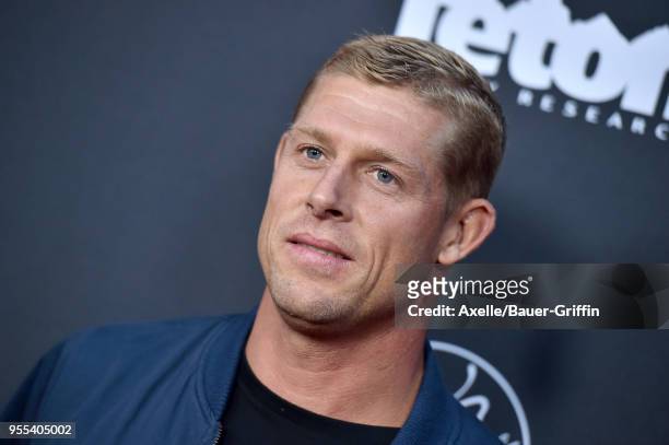 Surfer Mick Fanning arrives at Teton Gravity Research's 'Andy Irons: Kissed by God' World Premiere at Regency Village Theatre on May 2, 2018 in...