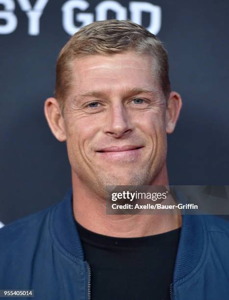 Surfer Mick Fanning arrives at Teton Gravity Research's 'Andy Irons: Kissed by God' World Premiere at Regency Village Theatre on May 2, 2018 in...