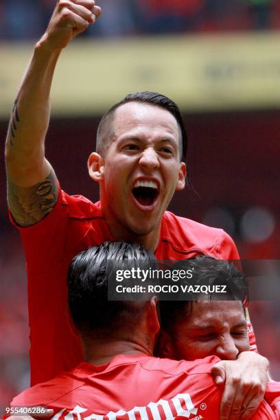 Players of Toluca celebrates their goal against Morelia during their Mexican Clausura tournament second leg quarterfinal football match at the...