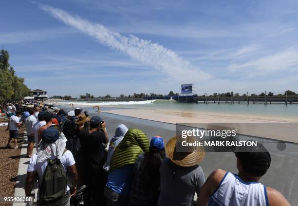 The crowd watches as Tyler Wright of Australia surfs during the qualifiers for the final of theWorld Surf League Founders' Cup of Surfing, at the...