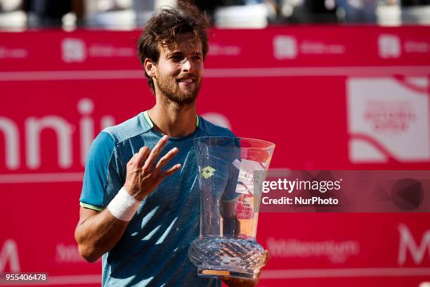 Portuguese tennis player Joao Sousa celebrates after winning his Millennium Estoril Open ATP Singles final tennis match against North-American tennis...