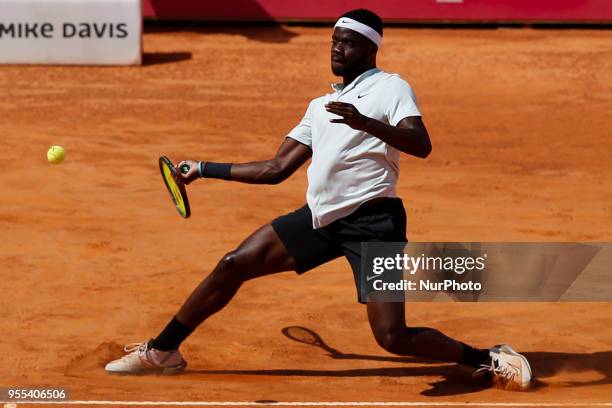 North-American tennis player Frances Tiafoe returns a ball to Portuguese tennis player Joao Sousa during their Millennium Estoril Open ATP Singles...