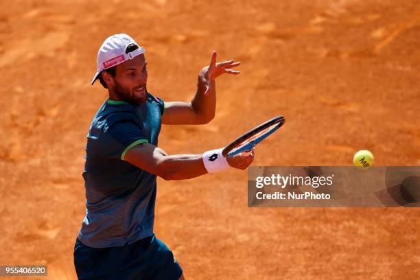 Portuguese tennis player Joao Sousa returns a ball to North-American tennis player Frances Tiafoe during their Millennium Estoril Open ATP Singles...