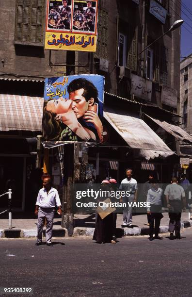 Affiche de cinéma dans une rue d'Alep, Syrie.