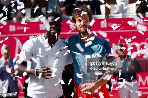 Portuguese tennis player Joao Sousa and North-American tennis player Frances Tiafoe hold their trophies during the award ceremony of the Millennium...